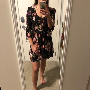 Floral button up dress with lace up back detail!
